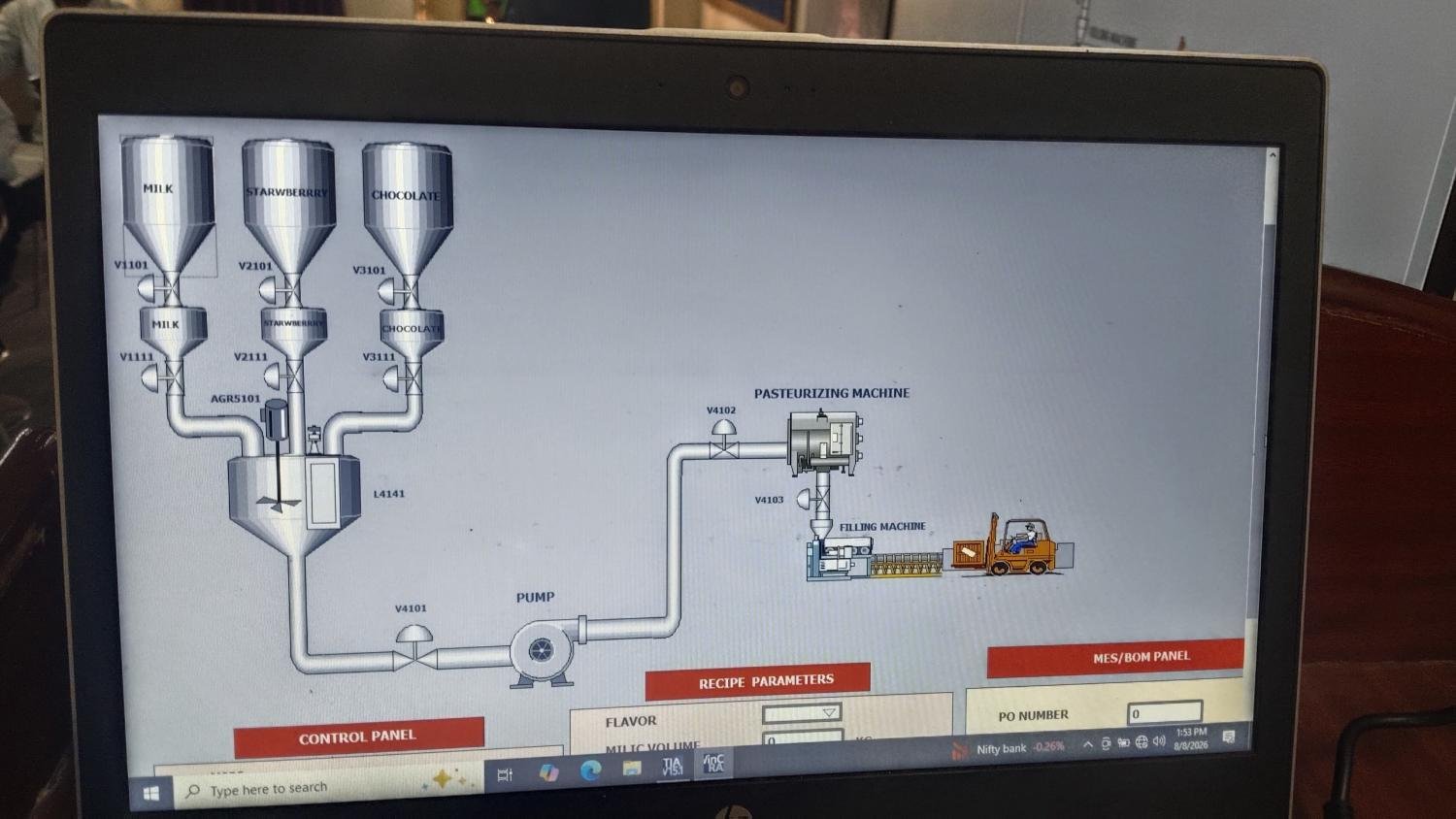 SCADA mimic screen for a batching process simulation