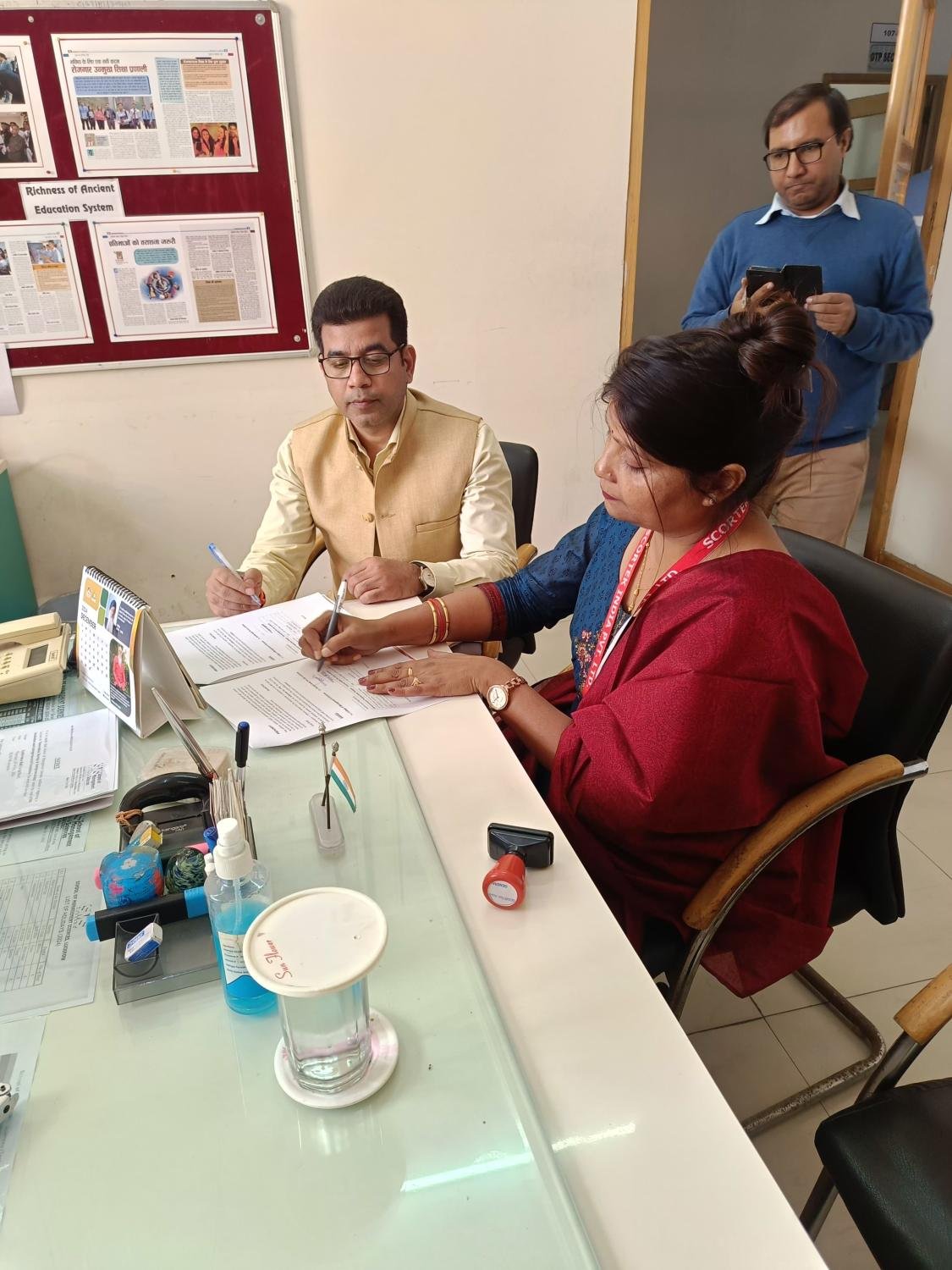 Training partnership paperwork at a partner college office